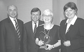 Annette Frauman receiving the Hatcher Award.